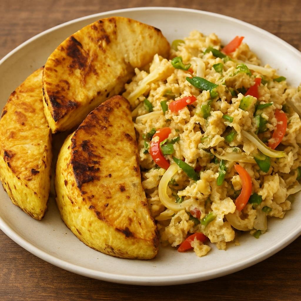 Entree: Dominica – Central Culinary Region – Roasted Breadfruit and Saltfish (Roasted local breadfruit served with flaked salted cod stewed with peppers, onions, and herbs) recipe